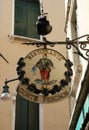 Vertical shot of a vintage restaurant sign in Venice, Italy