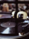 Vertical shot of a vinyl record on a turntable deck