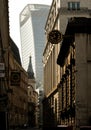 Vertical shot of the Walkie-Talkie between the buildings at sunrise