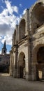 Vertical shot of the wall of Arles Amphitheatre. Roman arena in Arles, France. Royalty Free Stock Photo