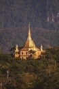 Vertical shot of Wat Pa Phon Phao on a hill of Luang Prabang, Laos