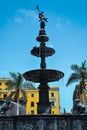 Vertical shot of the water fountain of the main square of Lima, Peru during daylight Royalty Free Stock Photo