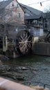 Vertical shot of a water wheel at the old mill in pigeon forge, Tennessee Royalty Free Stock Photo