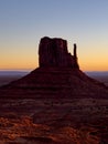 Vertical shot of West Mitten Butte in Monument Valley at sunset. Utah, United States. Royalty Free Stock Photo