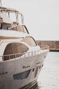 Vertical shot of a white luxury yacht sailing in the sea Royalty Free Stock Photo