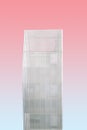 Vertical shot of a white metal structure on a pink background Royalty Free Stock Photo