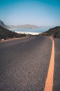 Vertical shot of a winding road leading to Whitesands beach in western Cape, South Africa