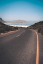 Vertical shot of a winding road leading to Whitesands beach in western Cape, South Africa