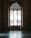 Vertical shot of a window in Saint Nicolas church in Valencia, Spain