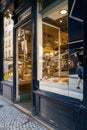 Vertical shot of the the windows of Stohrer Patisserie store, Paris, France