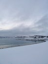 Vertical shot of the winter in the Arctic region, Hillesoy, Kvaloya Island, Tromso, Norway Royalty Free Stock Photo