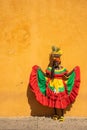 Vertical shot of a woman wearing traditional dress in Cartagena, Colombia