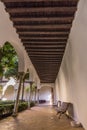 Vertical shot of wooden benches in Espacio Santa Clara in Seville, Spain