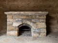 a vertical shot of a wooden fireplace with a white stone wall in the middle of a house
