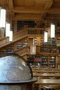 Vertical shot of the wooden interior of the Royal University of Leuven's library, Belgium