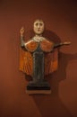 Vertical shot of a wooden sculpture of Saint Paraskevi of Iconium