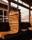 Vertical shot of wooden seats inside a wagon of a train in Brecon Mountain Railway, Wales Royalty Free Stock Photo