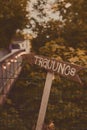 Vertical shot of wooden sign with arrow with german "Trauung" - wedding text Royalty Free Stock Photo