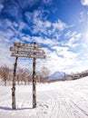 Vertical shot of a wooden sign at Niseko ski resort on the northern Japanese island of Hokkaido