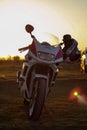 Vertical shot of a Yamaha FZR motorbike in the sunset