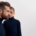 Vertical shot of young father and son portrait