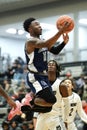 Vertical shot of a young male player on the court at a fall Indiana high school basketball game Royalty Free Stock Photo