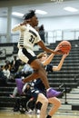 Vertical shot of young male players on the court at a fall Merrillville high school basketball game Royalty Free Stock Photo