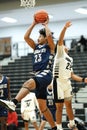 Vertical shot of young male players on the court at a fall Merrillville high school basketball game Royalty Free Stock Photo