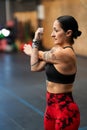 Mature sportive woman warming up in the gym Royalty Free Stock Photo