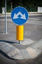 Vertical signal near roundabout on the street Royalty Free Stock Photo