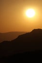 Vertical Silhouette Sunrise of Hazy Misty Mountain Royalty Free Stock Photo