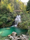 Vertical of a small waterfall falling into a plunge pool Royalty Free Stock Photo