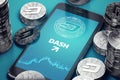 Vertical smartphone with Dashcoin growth chart on-screen among piles of silver Dashcoins. Dashcoin growth