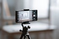 Vertical Smartphone Mockup on Tripod in Studio Royalty Free Stock Photo