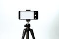 Vertical Smartphone Mockup on Tripod in Studio Royalty Free Stock Photo