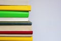 Vertical stack of colorful books. Free space for text Royalty Free Stock Photo