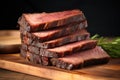 vertical stack of smoked beef brisket slices