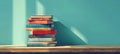 Vertical stack of vibrant books. A neat pile of vintage reading books on green background. Concept of academic