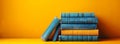 Vertical stack of vibrant books. A neat pile of vintage reading books on yellow background. Concept of academic