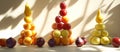 Vertical Stacks of Apples, Plums, and Pears with Light and Shadow Play, generative ai Royalty Free Stock Photo