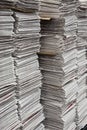 Vertical stacks of newspapers