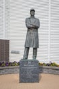 Vertical of the Statue of Bud Grant in the park of the Investors Group Field in Winnipeg, Canada