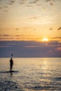 Vertical of the statue of King Neptune captured at a scenic seascape at sunrise in Varna, Bulgaria