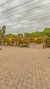 Vertical Stone brick driveway and patio with fire pit and dining area under a pavilion Royalty Free Stock Photo