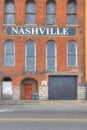 Vertical of store front with the name Nashville painted on Royalty Free Stock Photo