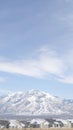 Vertical Striking Wasatch Mountains and South Jordan City in Utah during winter season