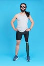 Smiley man with sunglasses standing with a prosthetic leg Royalty Free Stock Photo