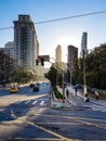 Vertical of sunlight beaming through buildings and streets of Sao Paulo, Brazil in the morning