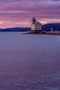 Vertical sunrise view of the historic Rondout Light, a lighthouse on the west side of the