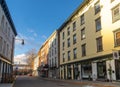 Vertical sunrise view of the shops and cafes of West Strand Street in historic Rondout district